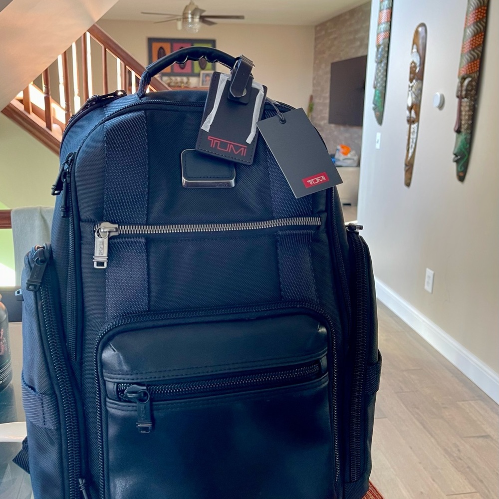 Tumi backpack black used only couple of times